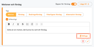 Orange "clip-on"-ikon i det nedre högra hörnet